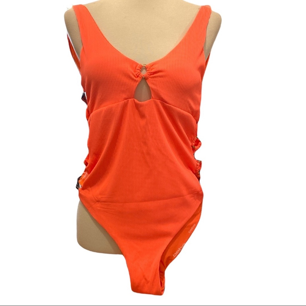Orange one piece open sides  swimsuit Sz XL BEBE neón Orange NEW with tags